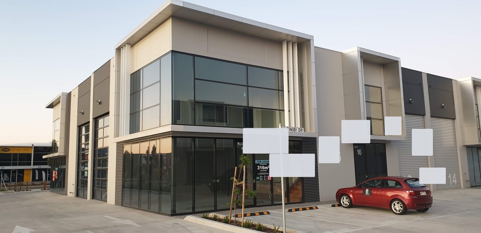Black-and-white commercial industrial property for replacement cost reporting scenario
