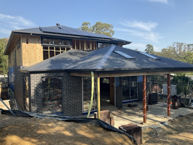 Construction progress claim report photo showing external building stage before drawdown review.