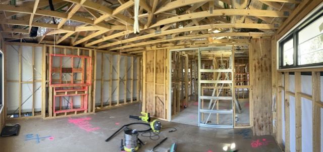 Cost to complete progress claim report photo showing timber framing stage for residential construction.