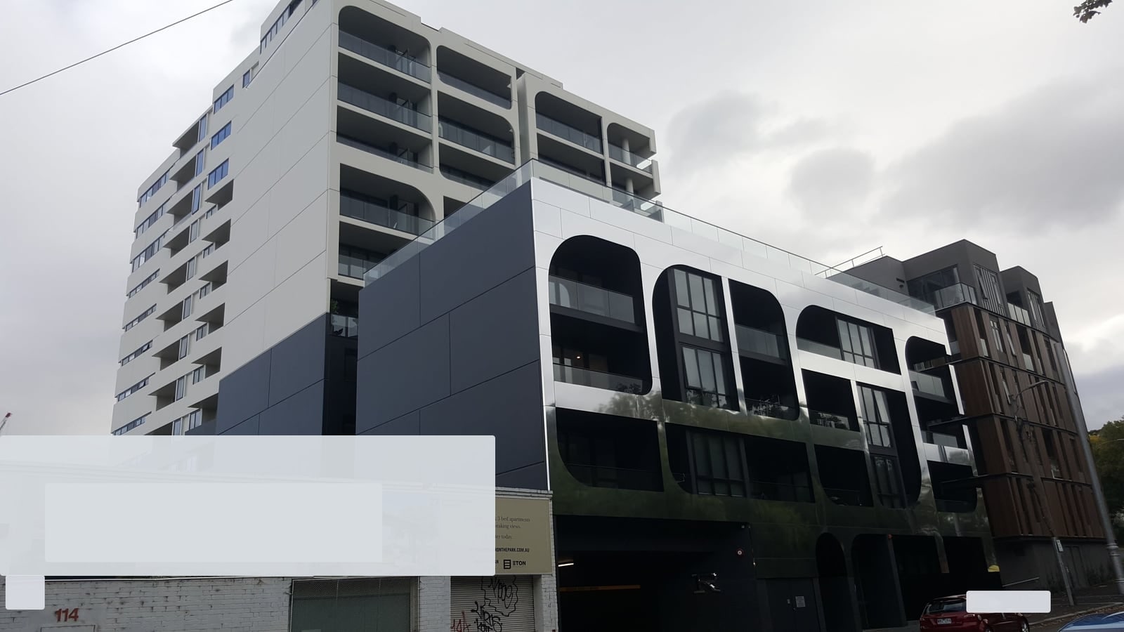 Black-and-white high-rise strata property used to represent insurance valuation and replacement cost reporting.
