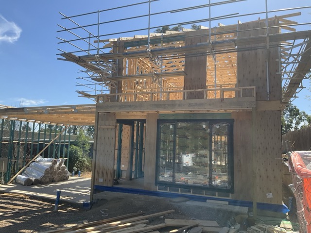 Owner-builder progress payment quantity surveyor report photo showing residential timber framing and external construction stage.
